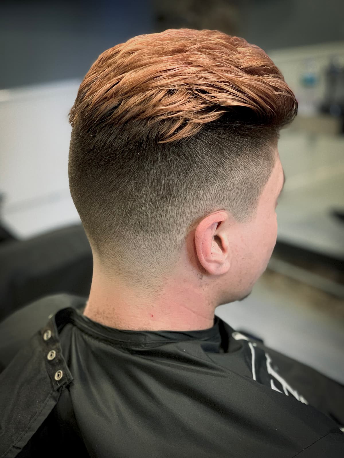 High End Barbershop lounge area decor